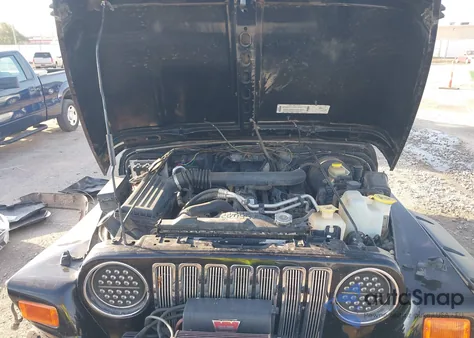 2000 Jeep Wrangler Sport from USA, damaged, VIN 1J4FA49S2YP752332